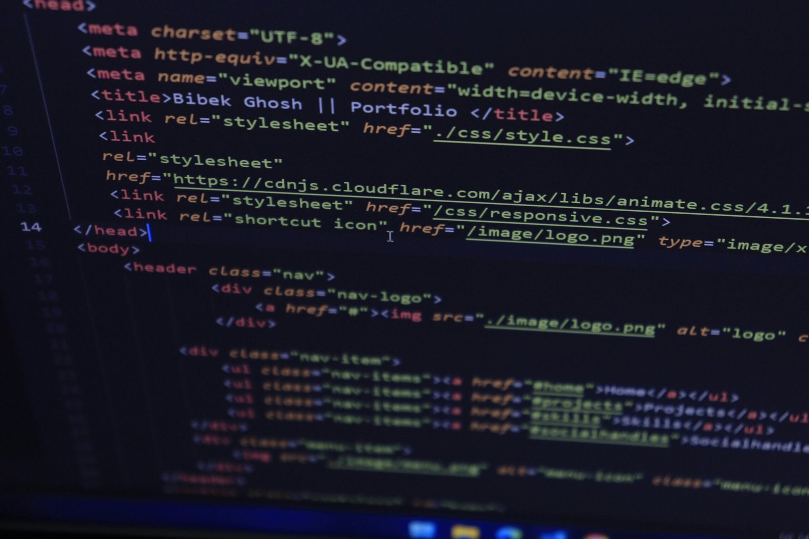 Close-up of HTML and CSS code displayed on a computer screen, ideal for tech and programming themes.